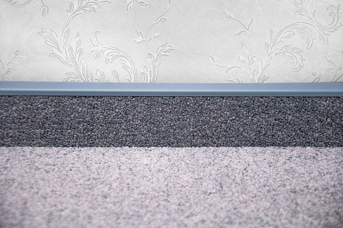 картинка Ковровый плинтус Korner LP-50 108 Графит магазин  Carpet-Center.ru являющийся официальным дистрибьютором в России